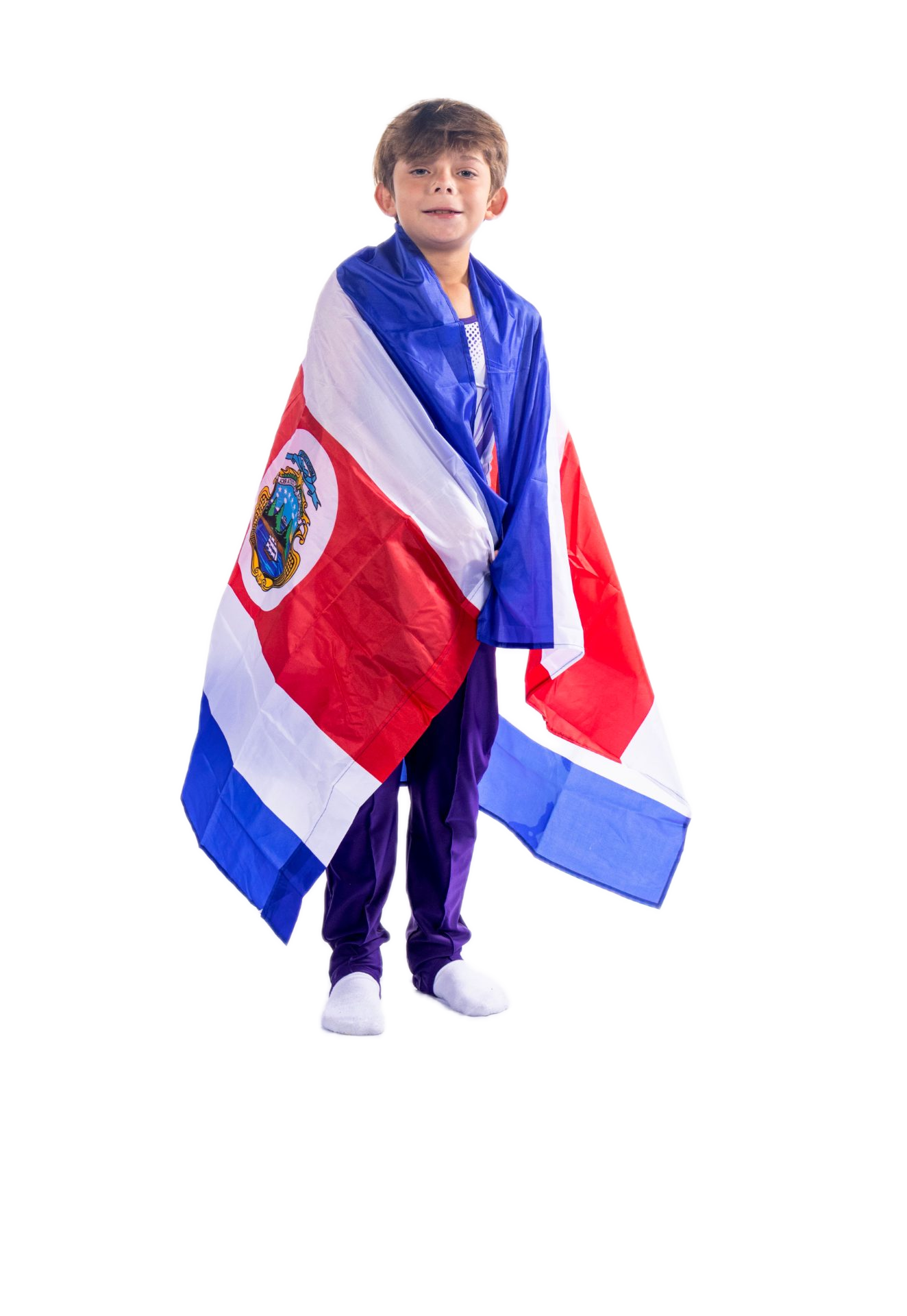 Gimnasta envuelto en la bandera de Costa Rica